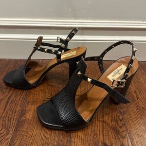 Lightly used black Valentino rockstud accents leather slingbck heels